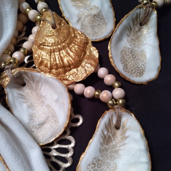 Set of 6. Natural Oyster Shell Napkin Rings - Picture 3 of 4